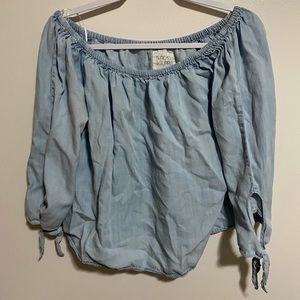 Blue cropped off the shoulder top